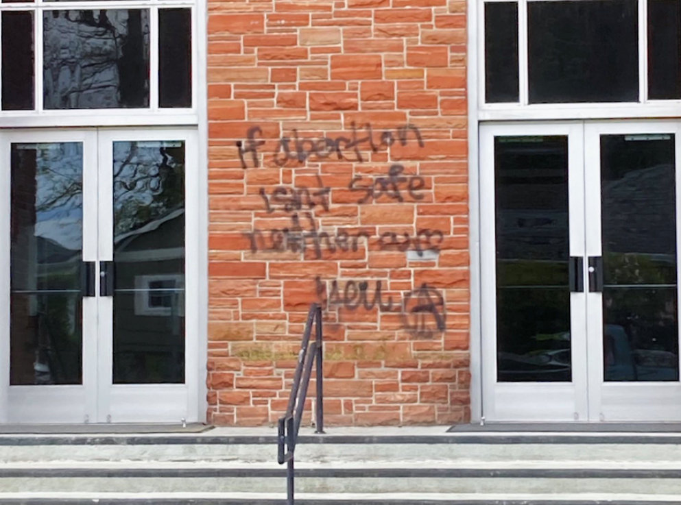"If abortion isn't safe neither are you" and the anarchists' "A" symbol were painted onto this LDS Church in Olympia on Sunday, May 22.